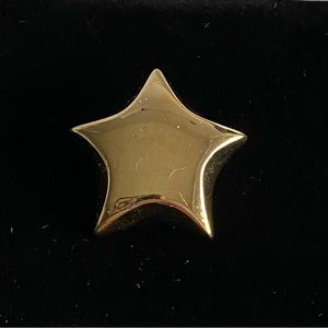 Vintage Givenchy gold tone star brooch